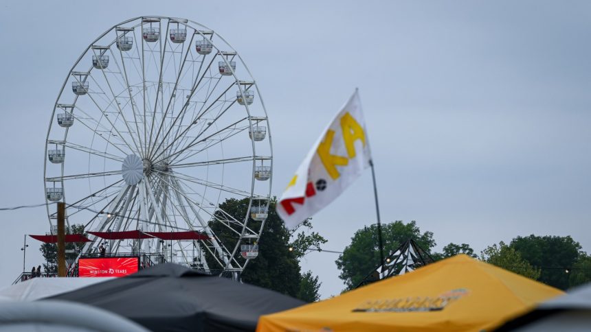 Thrilling Night Turns to Chaos: 30 Injured as Ferris Wheel Erupts in Flames at German Music Festival!