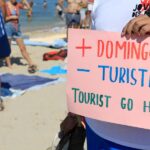 Spain’s Tourism Surge: How Water Gun Protests Are Adding a Splash of Controversy!